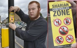 PIC BY DAVID NEW-8/7/2011-JAMAAL UDDIN OF 'MUSLIMS AGAINST CRUSADES' DECLARES A PART OF LEYTON UNDER 'SHARIAH LAW'. BEHIND HIM IS THE DEFUNCT OLIVER TWIST PUB, MUSLIMS BEING AGAINST ALCOHOL CONSUMPTION.